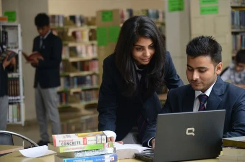 Student studying for distance degree program with guidance from TIMS Education in Kerala